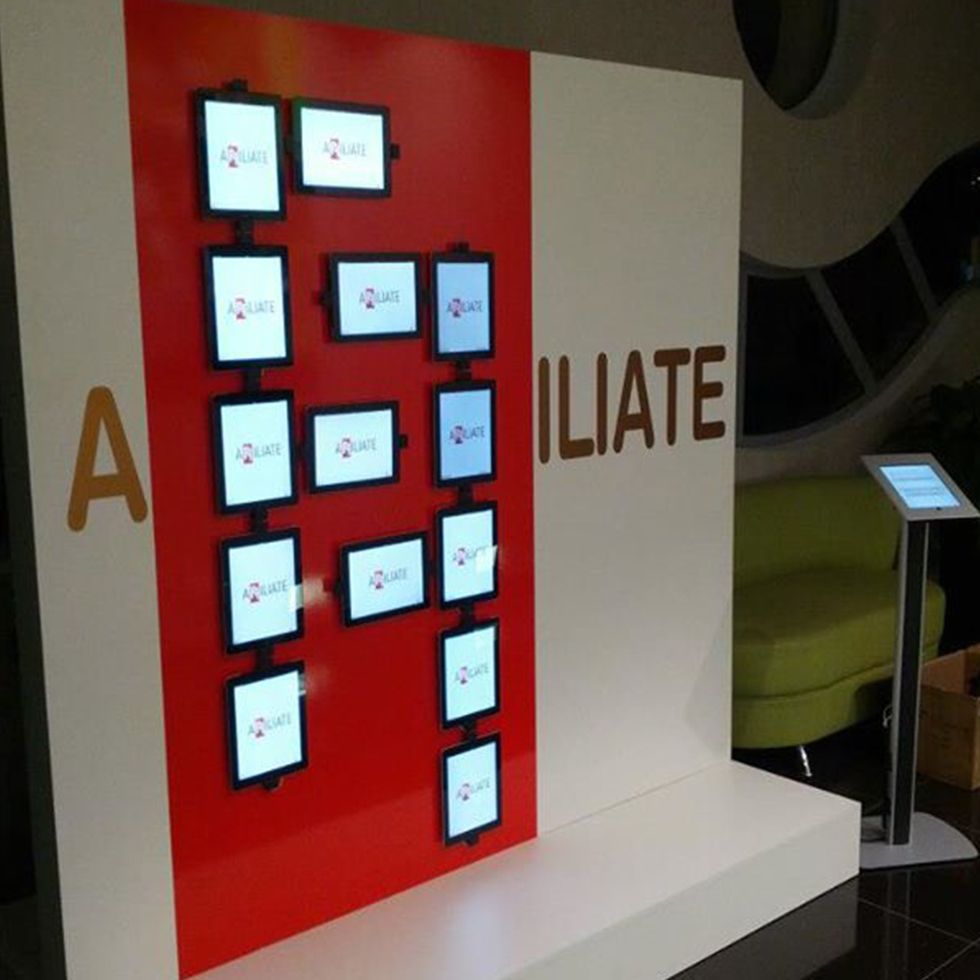 interactive iPad wall aligned to the company aspect